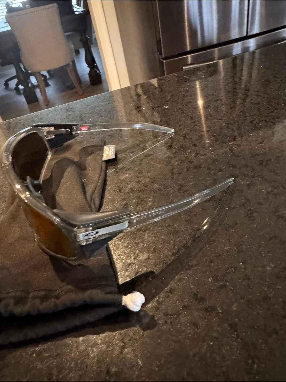 Oakley Shield Sunglasses with Red-Orange Mirrored Lens and Clear Frame